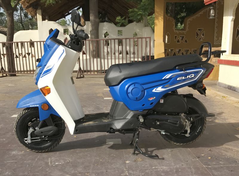 side of blue honda cliq 110 cc scooter