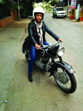 Sangeetha Jairam with her father's BMW motorcycle