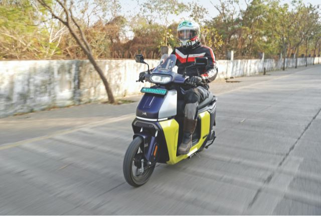 TVS Orbiter riding left front three fourth